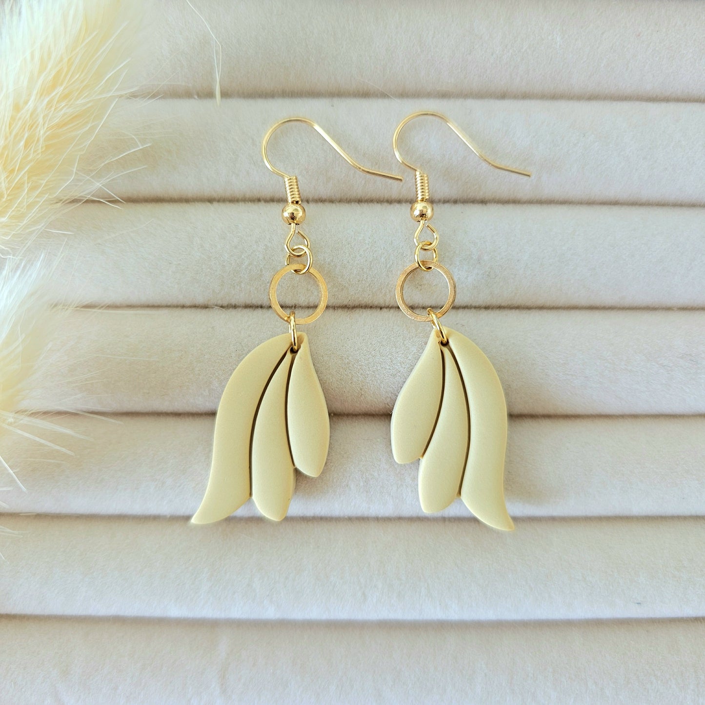 Gold leaf-shaped earrings